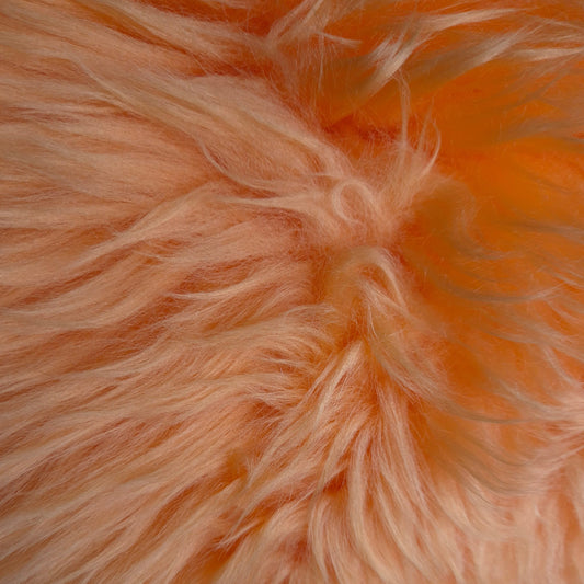 close up of deep pile sheepskin in mellow orange