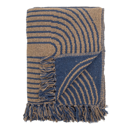  a recycled cotton throw, soft with a blue background and a very graphic curved pattern in a beige. It has a fringe