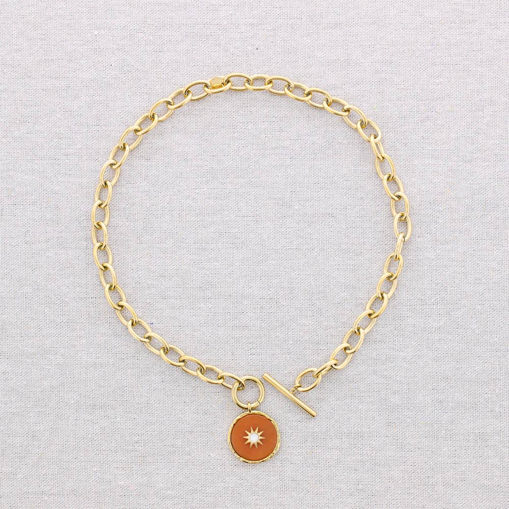 link necklace with orange stone pendant with star inset