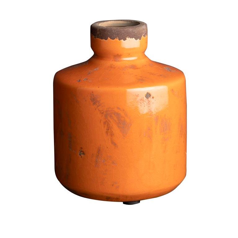 Enhance your home decor with our stylish Bottle Vase in orange. Made from high-quality ceramic, it's perfect for displaying dried flowers. Combine it with other vases from our range for a unique and eye-catching display. 