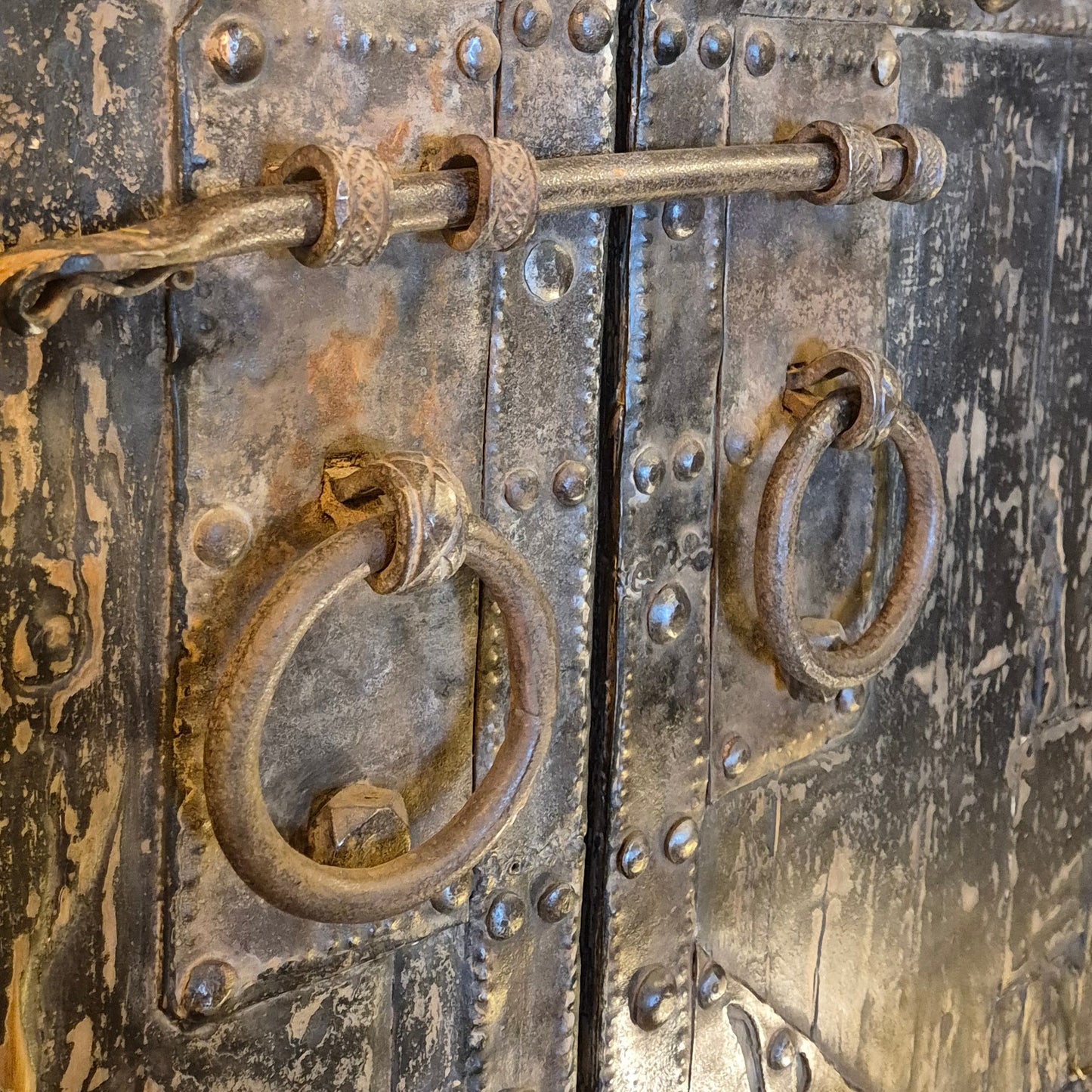 Two Morocan doors in beautiful condition with metal detail, round handles and a bolt