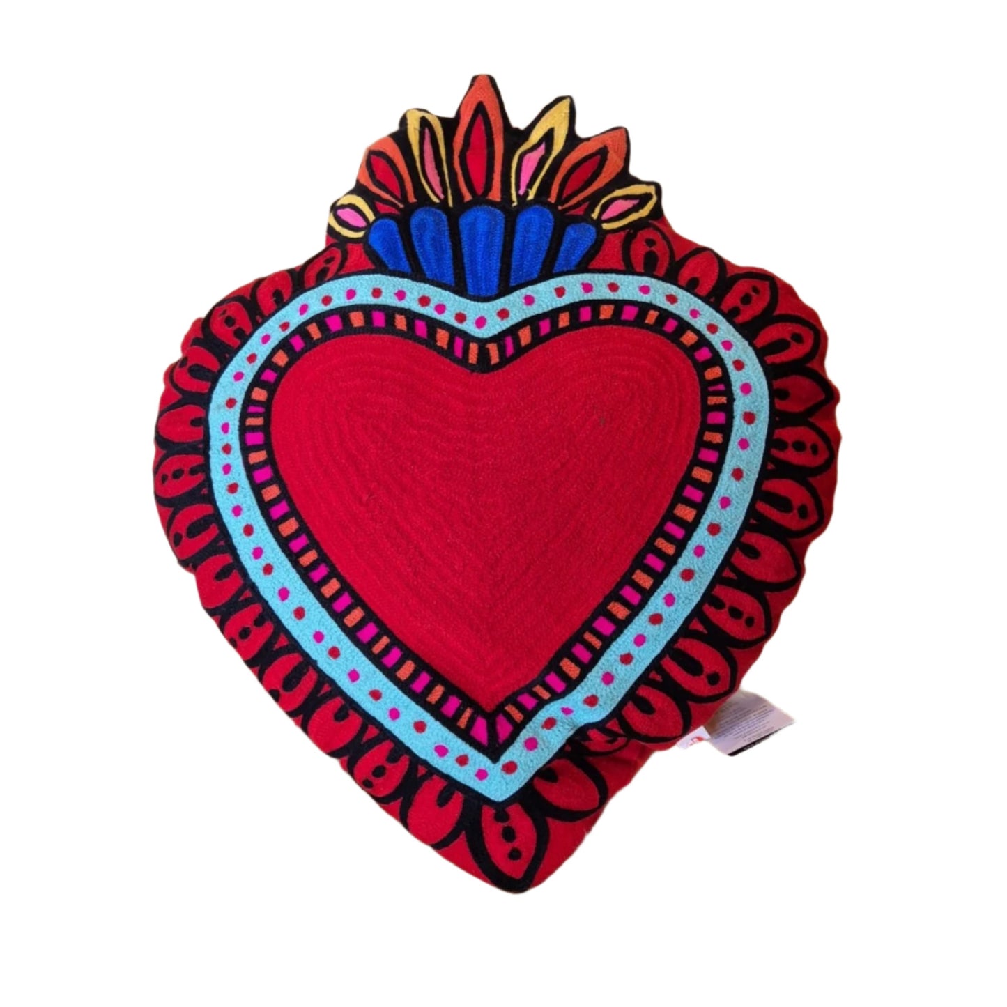 Back in stock. A statement cushion. The ever popular Milagro Heart Cushion in pink, is also available in red. Milagro means small miracle in Spanish and the Milagro Heart represents love healing and gratitude.
