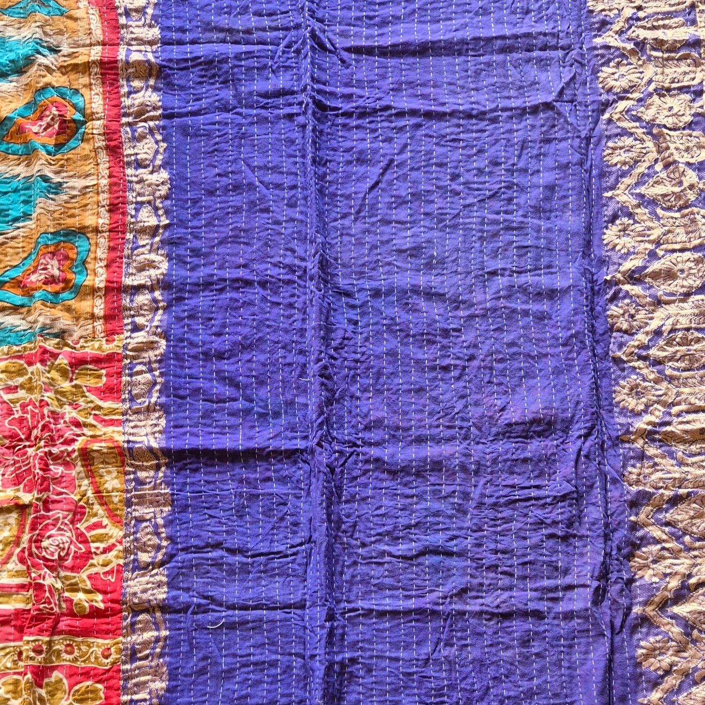A colourful throw, made from up-cycled vintage Indian fabrics. Completely unique, no two are ever the same.
Front and back are also different giving the opportunity for a different look in different seasons
The throw features the distinctive kantha stitch.
A sustainable heirloom piece for gifting or self gifting.
220cm x 135cm approx