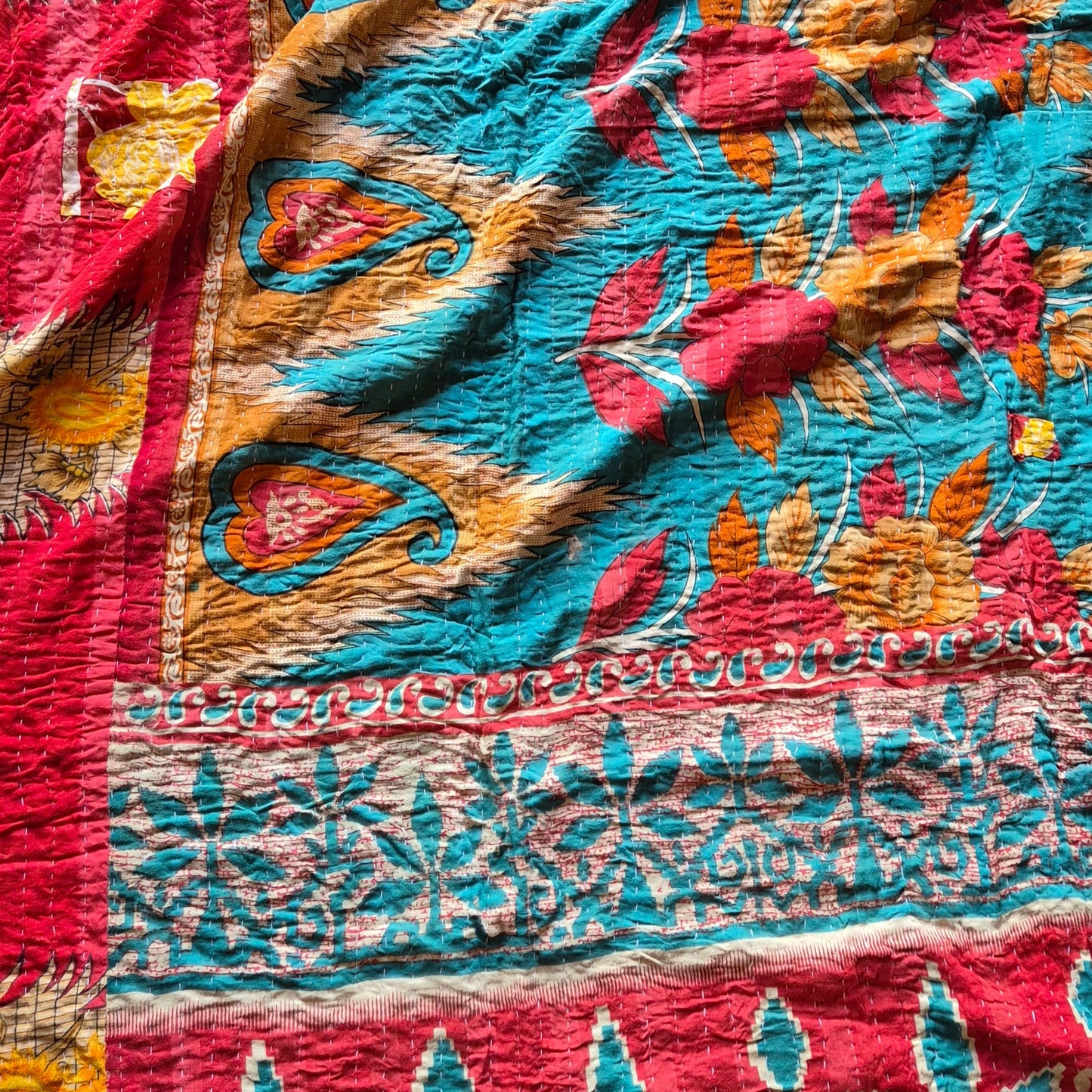 A colourful throw, made from up-cycled vintage Indian fabrics. Completely unique, no two are ever the same.
Front and back are also different giving the opportunity for a different look in different seasons
The throw features the distinctive kantha stitch.
A sustainable heirloom piece for gifting or self gifting.
220cm x 135cm approx