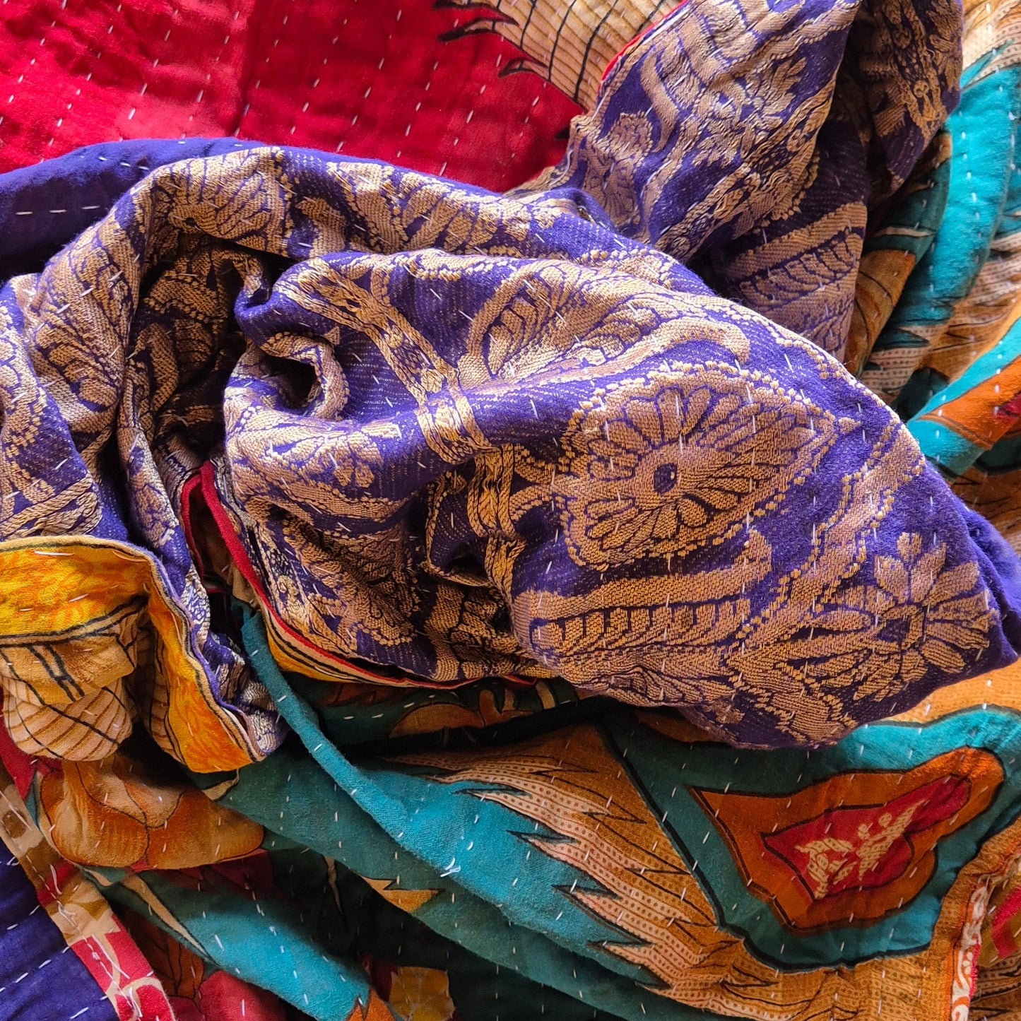 A colourful throw, made from up-cycled vintage Indian fabrics. Completely unique, no two are ever the same.
Front and back are also different giving the opportunity for a different look in different seasons
The throw features the distinctive kantha stitch.
A sustainable heirloom piece for gifting or self gifting.
220cm x 135cm approx