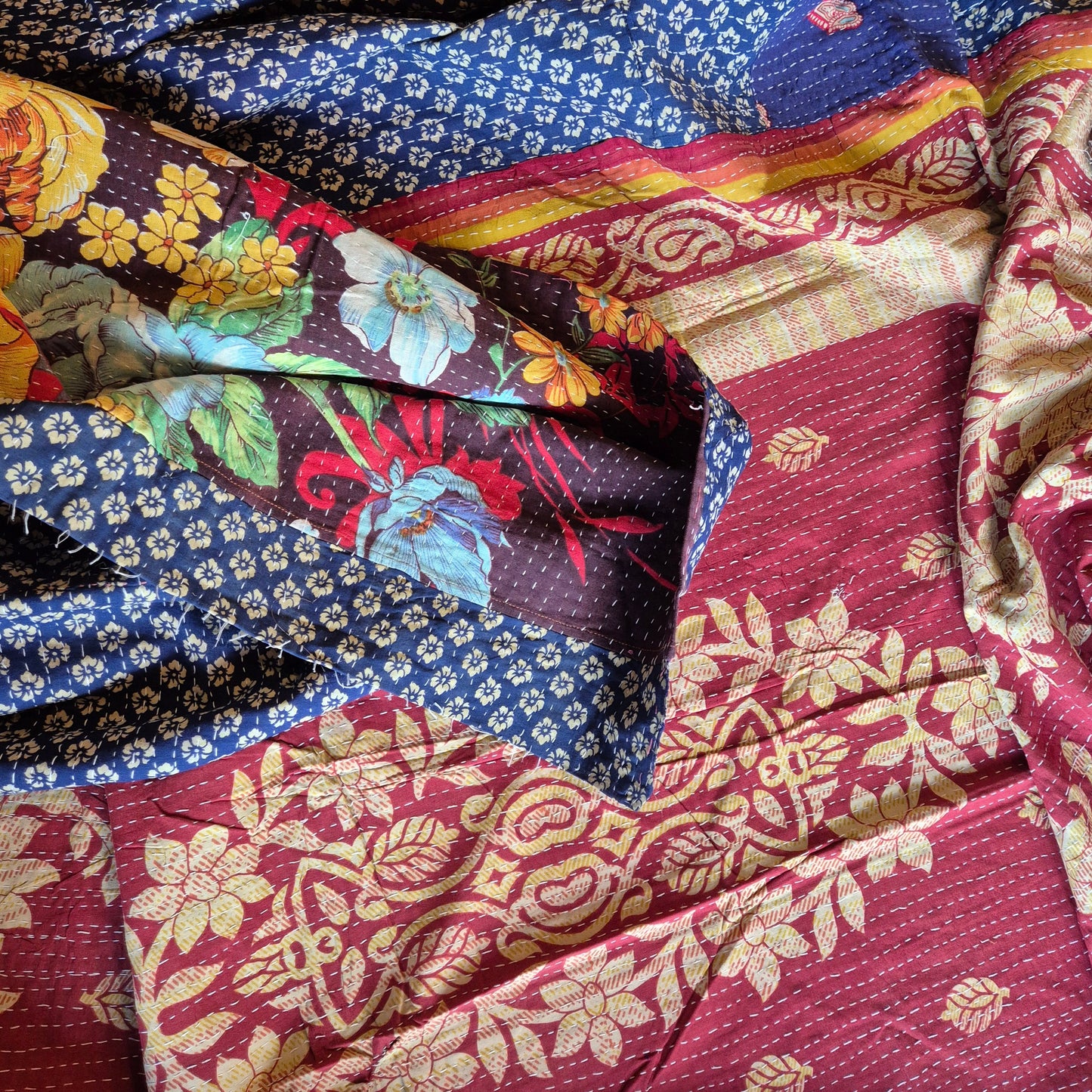 Indian throw different on each side with a classic kantha stitch