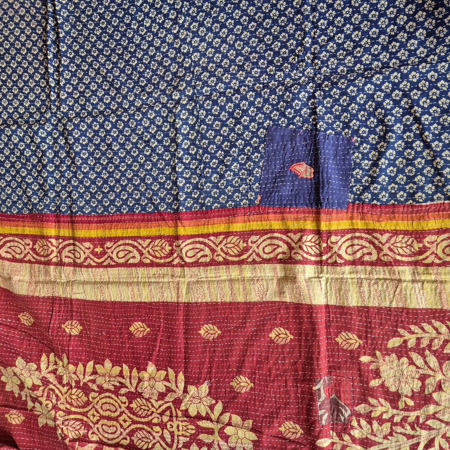 Indian throw different on each side with a classic kantha stitch