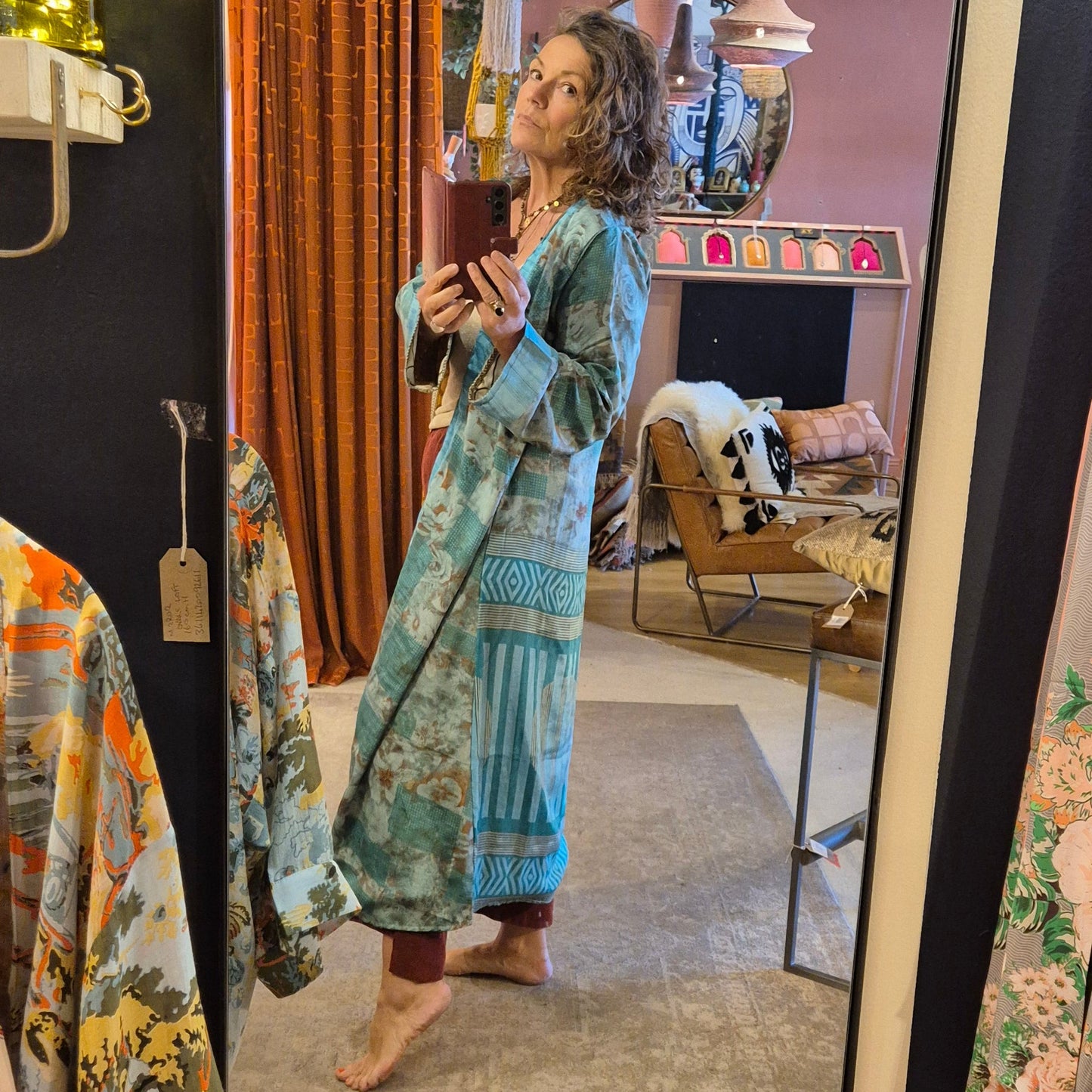 A reversible silk kimono made with vintage up-cycled silk sari fabric. Each side is completely different and each kimono is completely unique