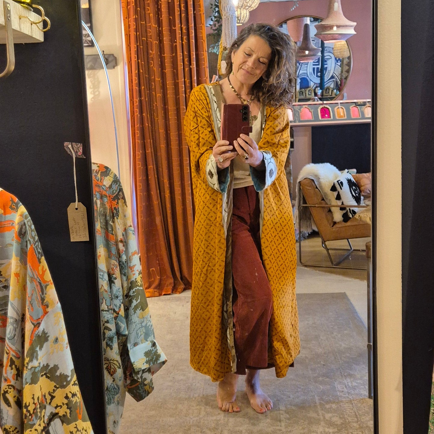 A reversible silk kimono made with vintage up-cycled silk sari fabric. Each side is completely different and each kimono is completely unique