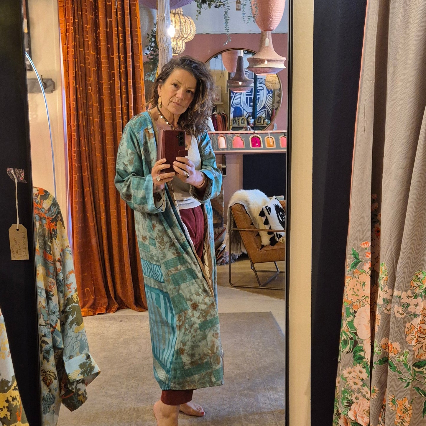 A reversible silk kimono made with vintage up-cycled silk sari fabric. Each side is completely different and each kimono is completely unique