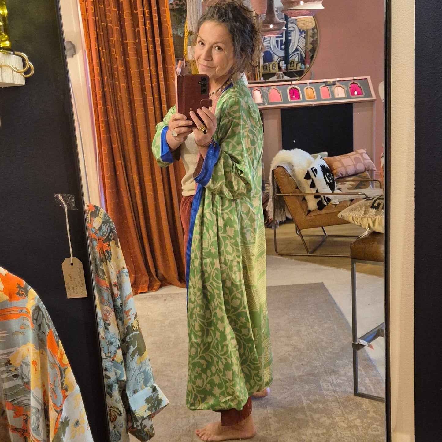 A reversible silk kimono made with vintage up-cycled silk sari fabric. Each side is completely different and each kimono is completely unique