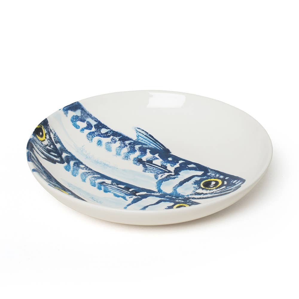 Ceramic dish with blue mackerel design hand painted on a white background