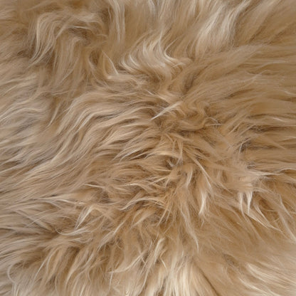 luxurious caramel coloured sheepskin rug