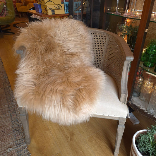 luxurious caramel coloured sheepskin rug