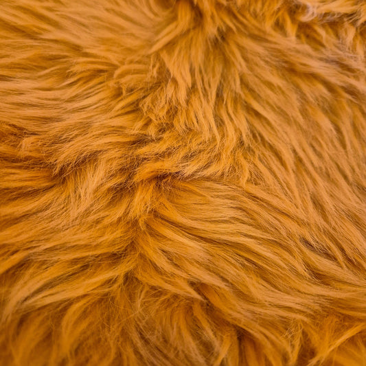 golden coloured sheepskin rug, luxurious and cosy. perfect for on a sofa, chair, bed or on the floor