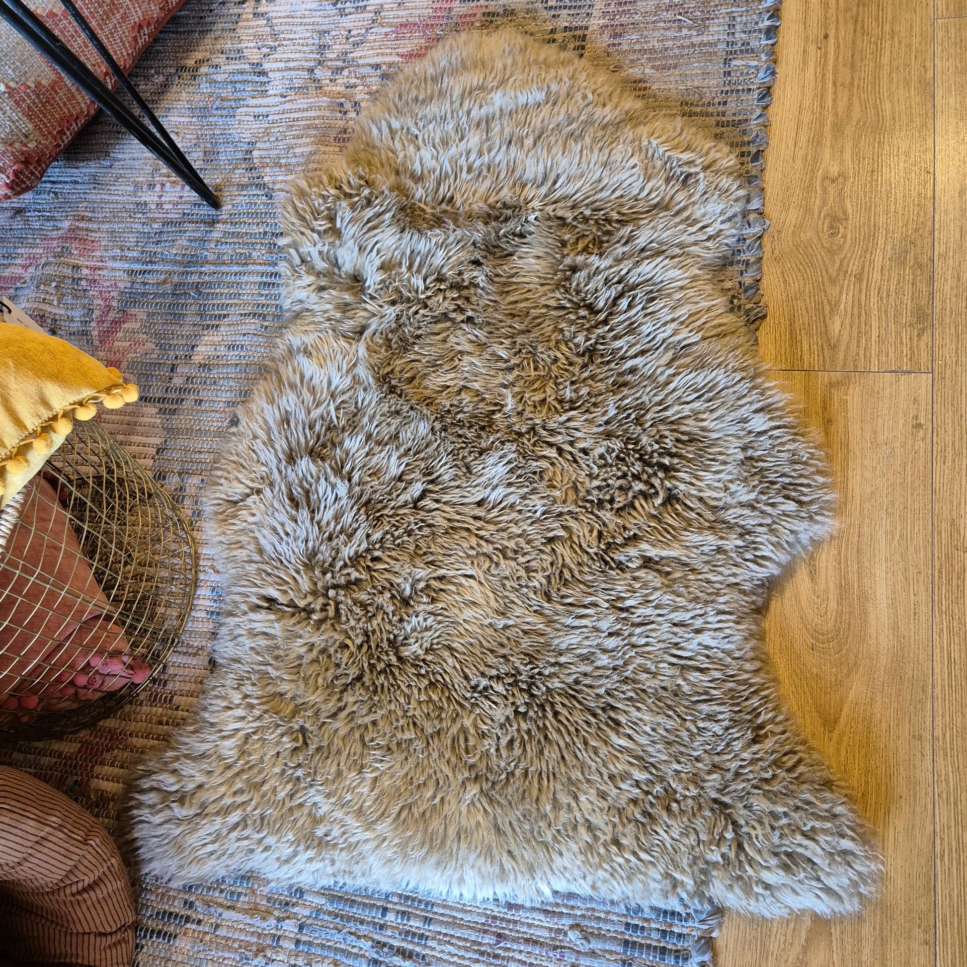 These sheepskins are short haired, curly and soft to the touch. Reminicent of childhood teddy bears.