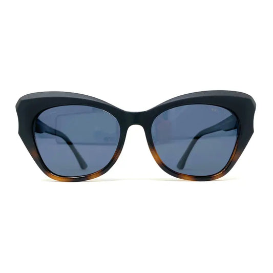 Cat eye style contemporary sunglasses with a substantial frame. Matt black on top blending in to a tortoise shell look