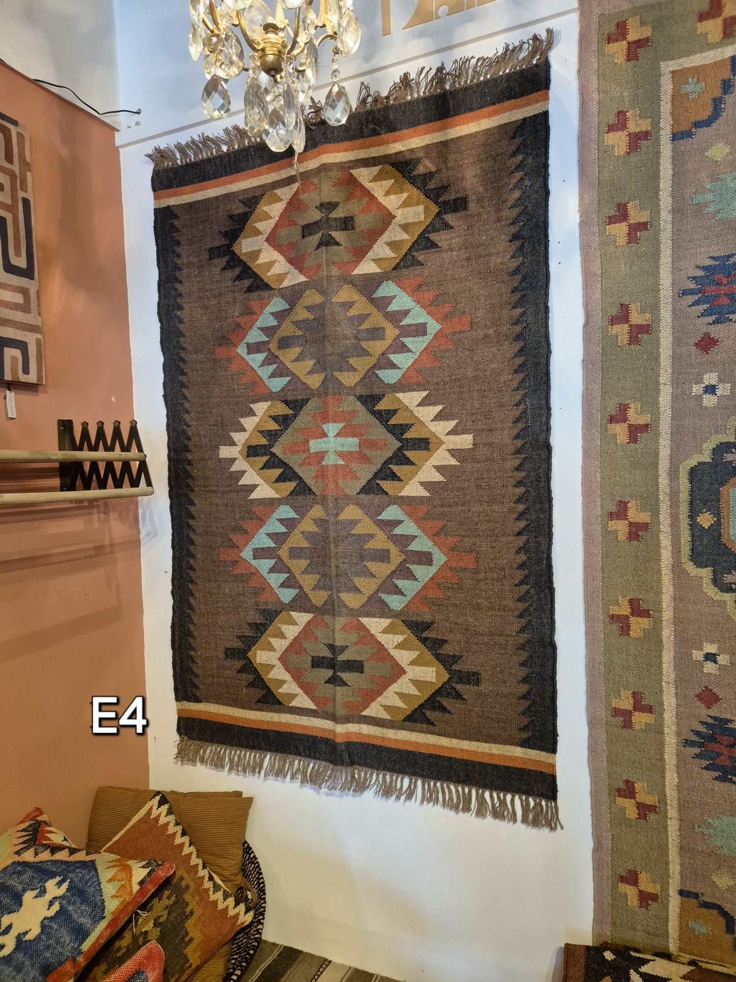 Add a touch of classic elegance to your space with this Kilim Rug (style 1). Handcrafted with jute for a rich and textured look, this 6x4ft rug boasts a beautiful earthy color palette that will bring warmth to any room.