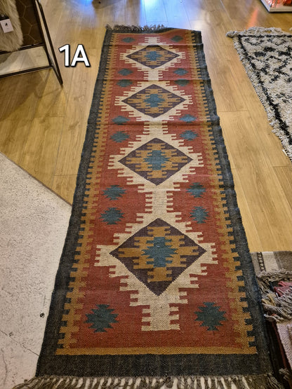 Add a touch of classic elegance to your space with this Kilim Rug (style 1). Handcrafted with jute for a rich and textured look, this 6x4ft rug boasts a beautiful earthy color palette that will bring warmth to any room.