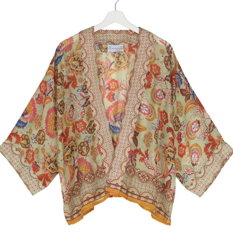 Kimono with indian inspired design of flowers on taupe background