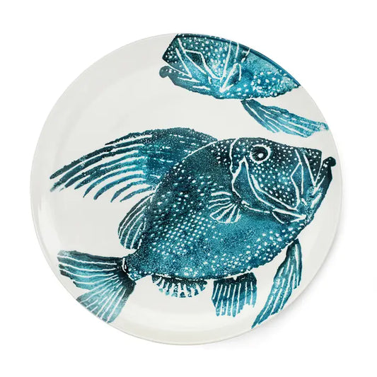 an oversized platter white background and featuring a blue John dory fish and a little pit of a second fish