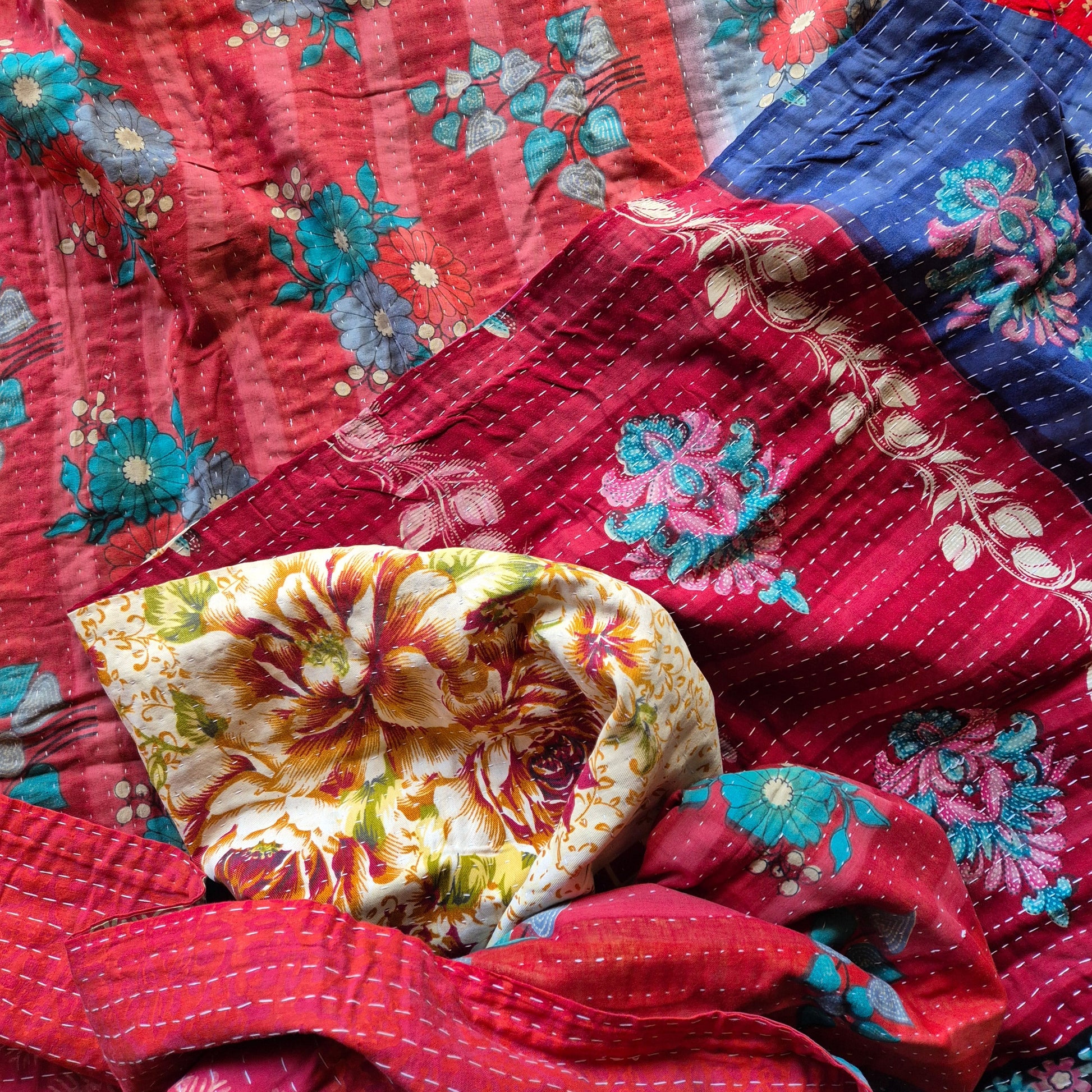 Indian throw different on each side with a classic kantha stitch