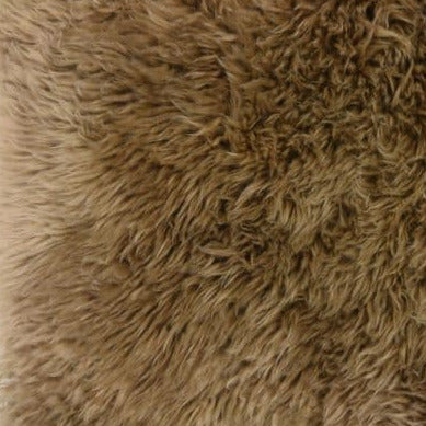 These sheepskins are short haired, curly and soft to the touch. Reminicent of childhood teddy bears.