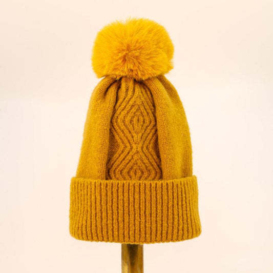 Mustard bobble Hat with geometric design