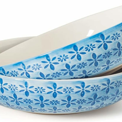 Blue embossed supper bowls with repeated flower motif