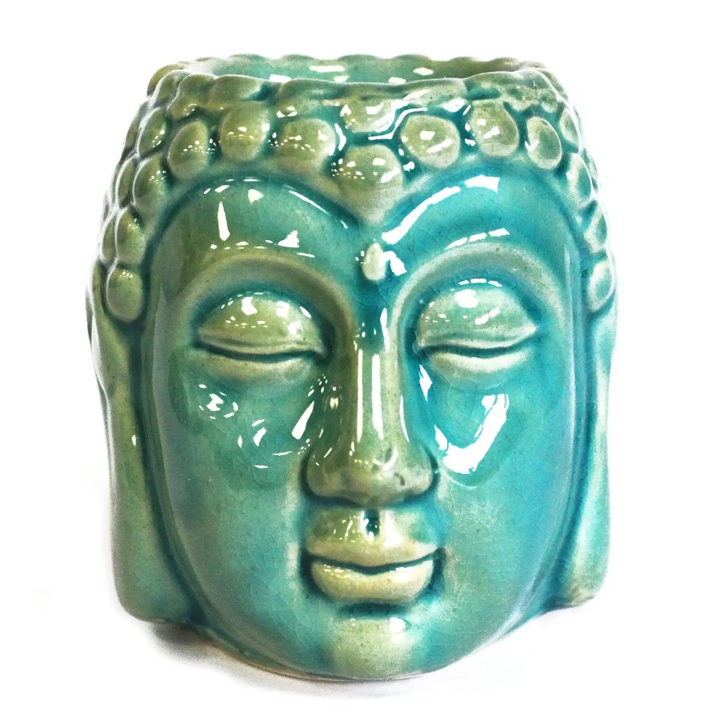 an oil burner shaped like a buddha head.