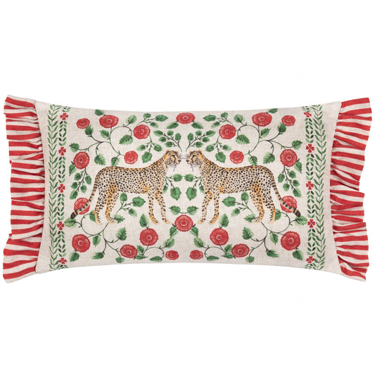 Decorative pillow with leopards, flowers, and ruffled edges on a white background