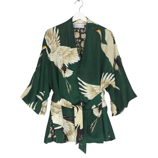 wrap jacket with stork design on green background