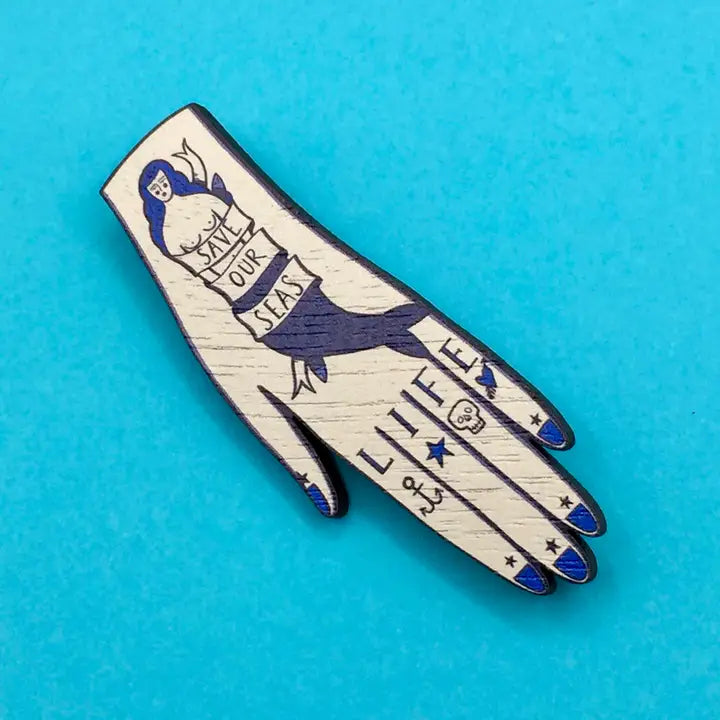 Ideal for ink heads and ink hands enthusiasts, this brooch adds a unique touch to any outfit while promoting a vital cause. Celebrate the beauty of the sea and the importance of its preservation with this charming and meaningful accessory.