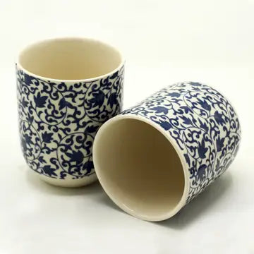 small handle less tea cups in blue design