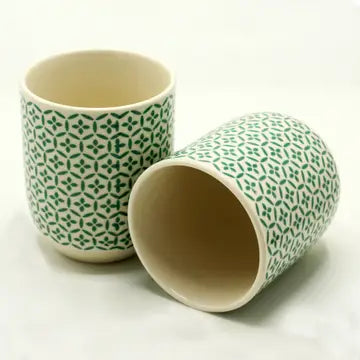 small handleless tea cups with green mosaic design