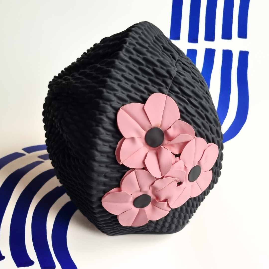 Retro black swim hat with three pink flowers on the side