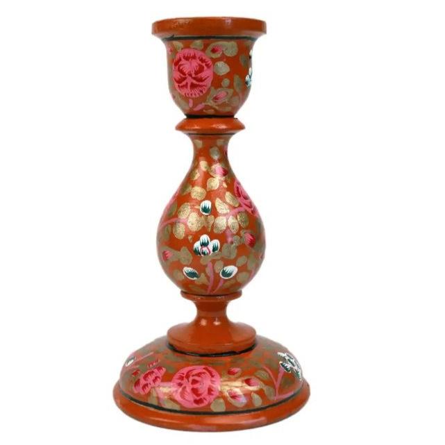 red wooden candleholder with gold leaves and pink and green flowers