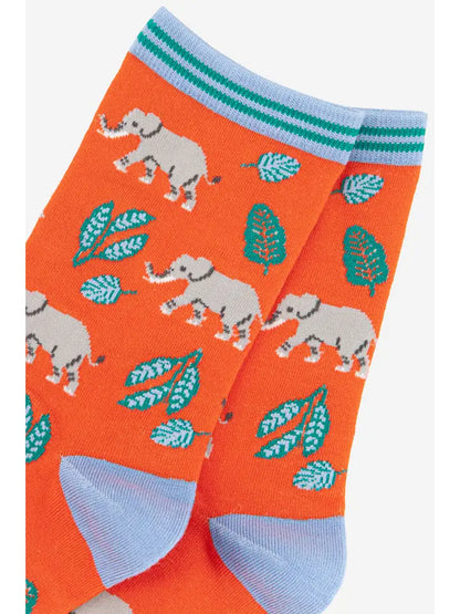 Bamboo ladies socks. An orange background with an elephants and leaf design