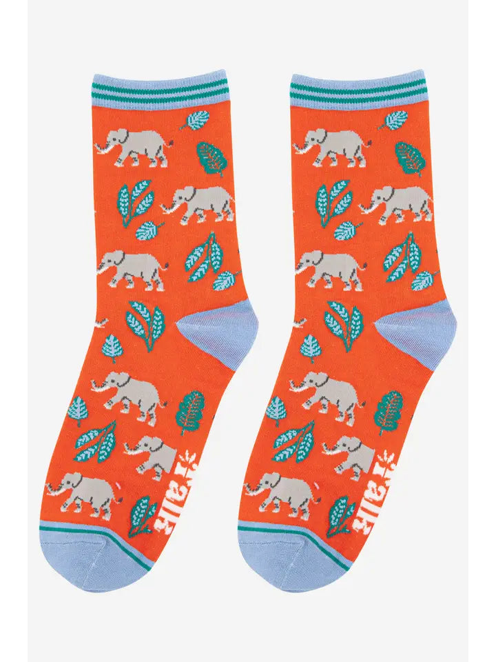 Bamboo ladies socks. An orange background with an elephants and leaf design