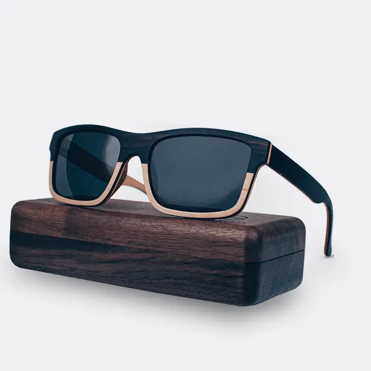 The Acer Wayfarer, a great pair of sunglasses made of Maple wood combined with Ebony.  The top of the frame is black wood and the lower part is pale maple , they come in a beautiful wallnut gift box and look and feel very high end