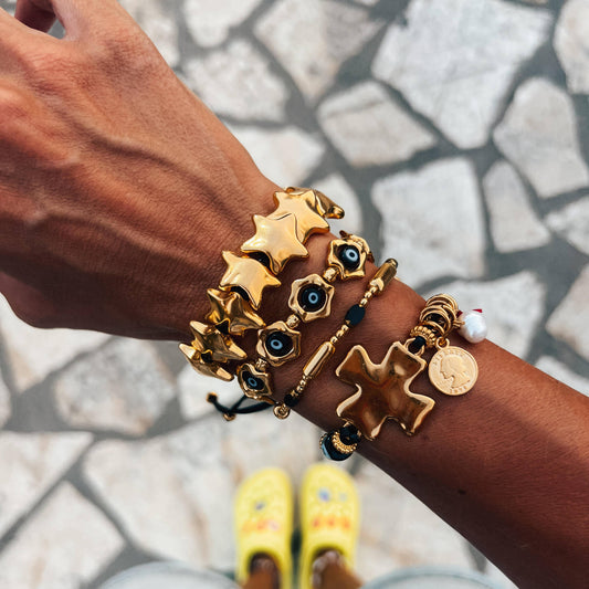 gold star bracelet with adjustable black cord
