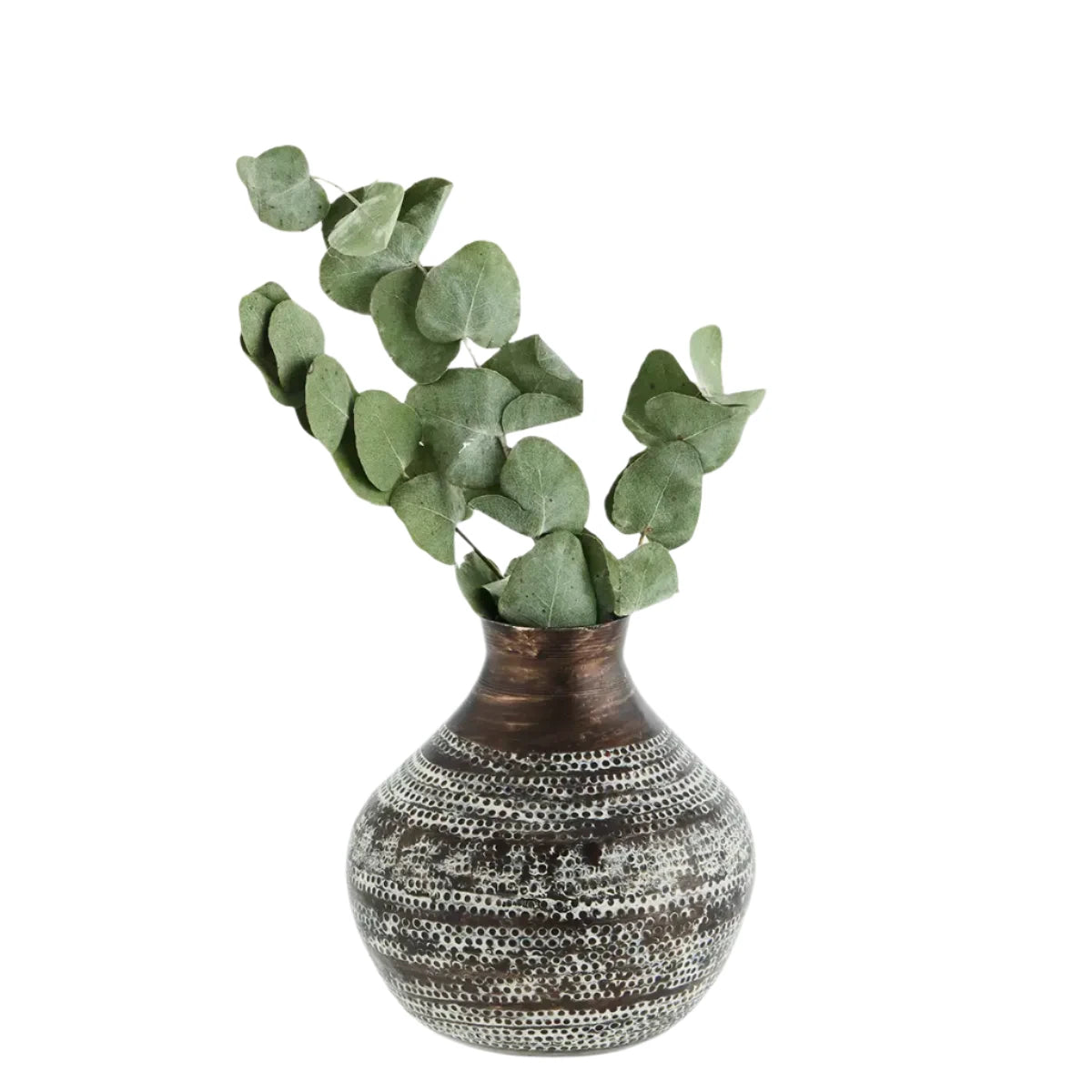 This hammered aluminum vase is not only a stunning piece of home decor, but it also serves as a sustainable and ethical option.