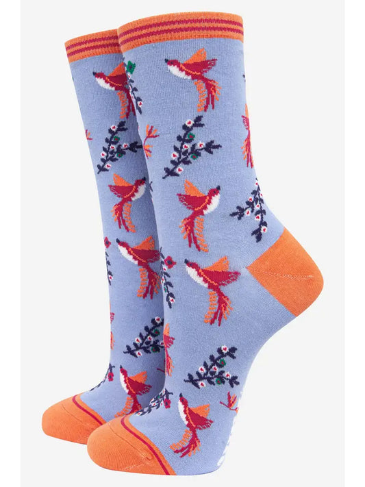 bamboo ladies socks with a cornflower blue background and a hummingbird theme