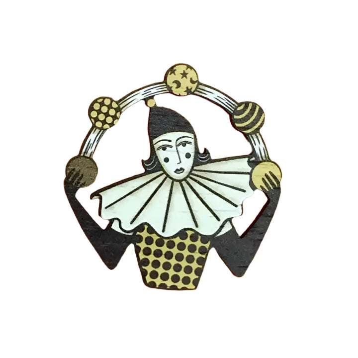 wooden pin brooch with juggler white and black and yellow