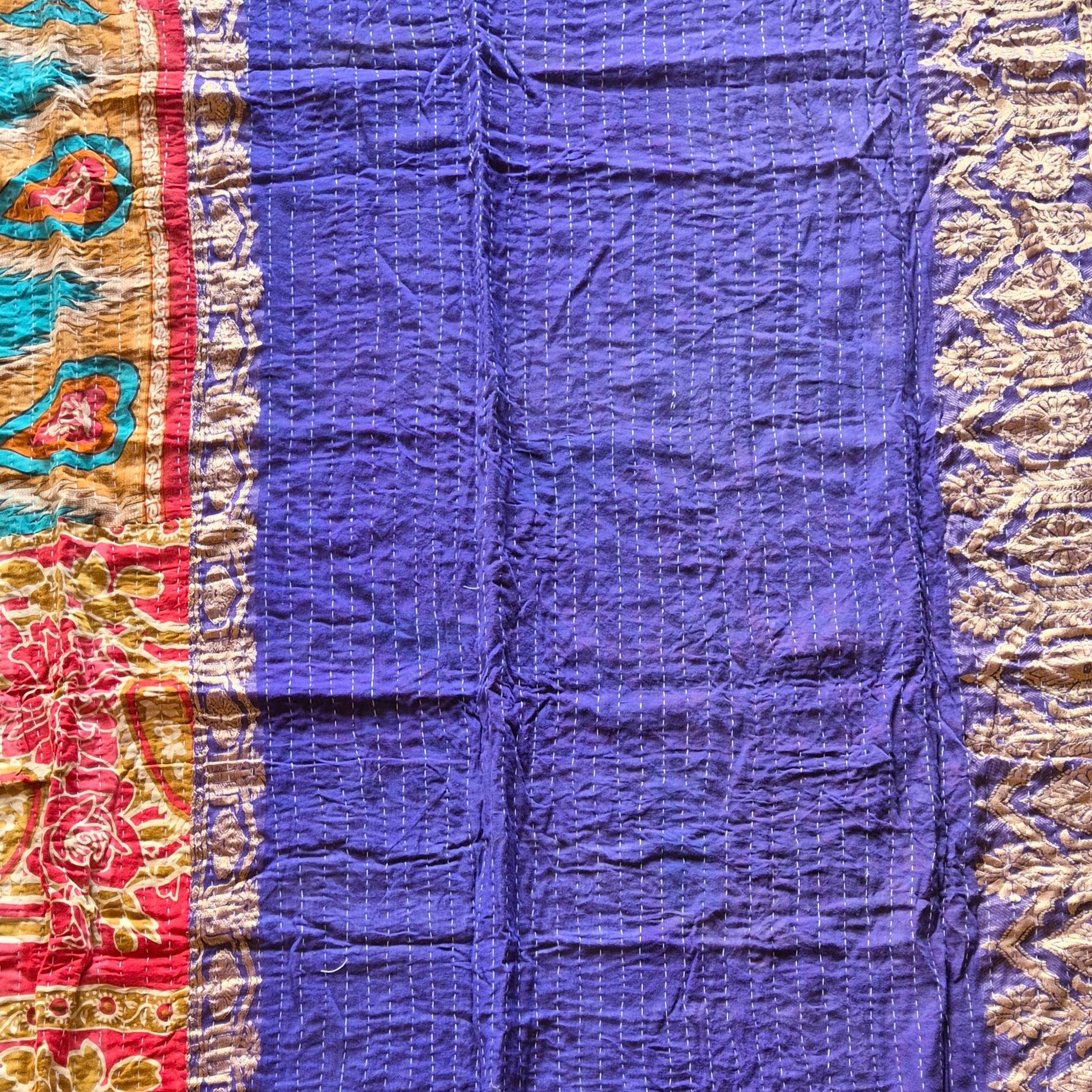 A colourful throw, made from up-cycled vintage Indian fabrics. Completely unique, no two are ever the same.
Front and back are also different giving the opportunity for a different look in different seasons
The throw features the distinctive kantha stitch.
A sustainable heirloom piece for gifting or self gifting.
220cm x 135cm approx