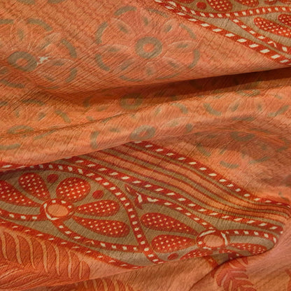 A reversible silk kimono made with vintage up-cycled silk sari fabric. Each side  is completely different and each kimono is completely unique