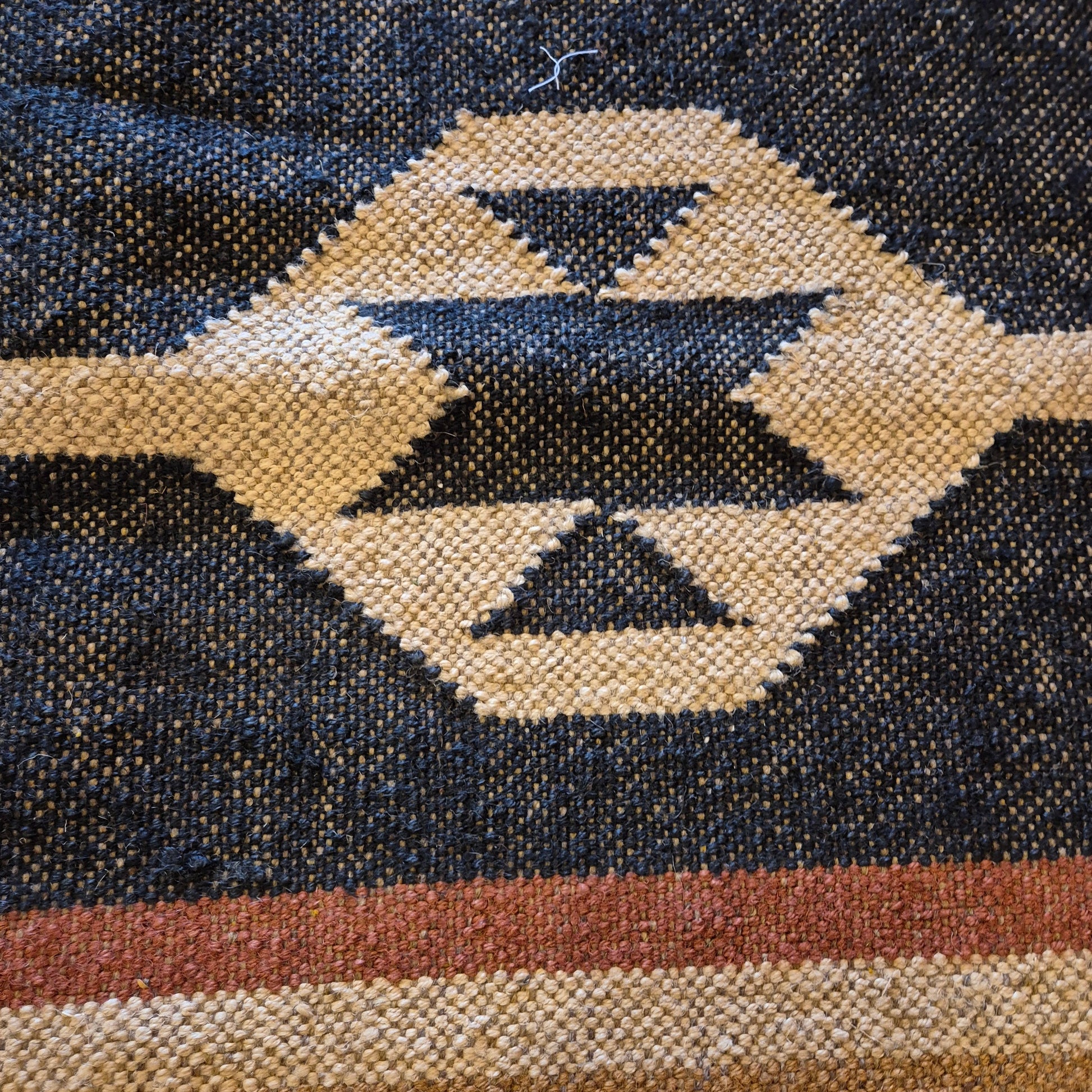 Add a touch of classic elegance to your space with this Kilim Rug (style krs14). Handcrafted with jute and wool for a rich and textured look, this rug boasts a beautiful earthy color palette that will bring warmth to any room.

5ft X 3ft