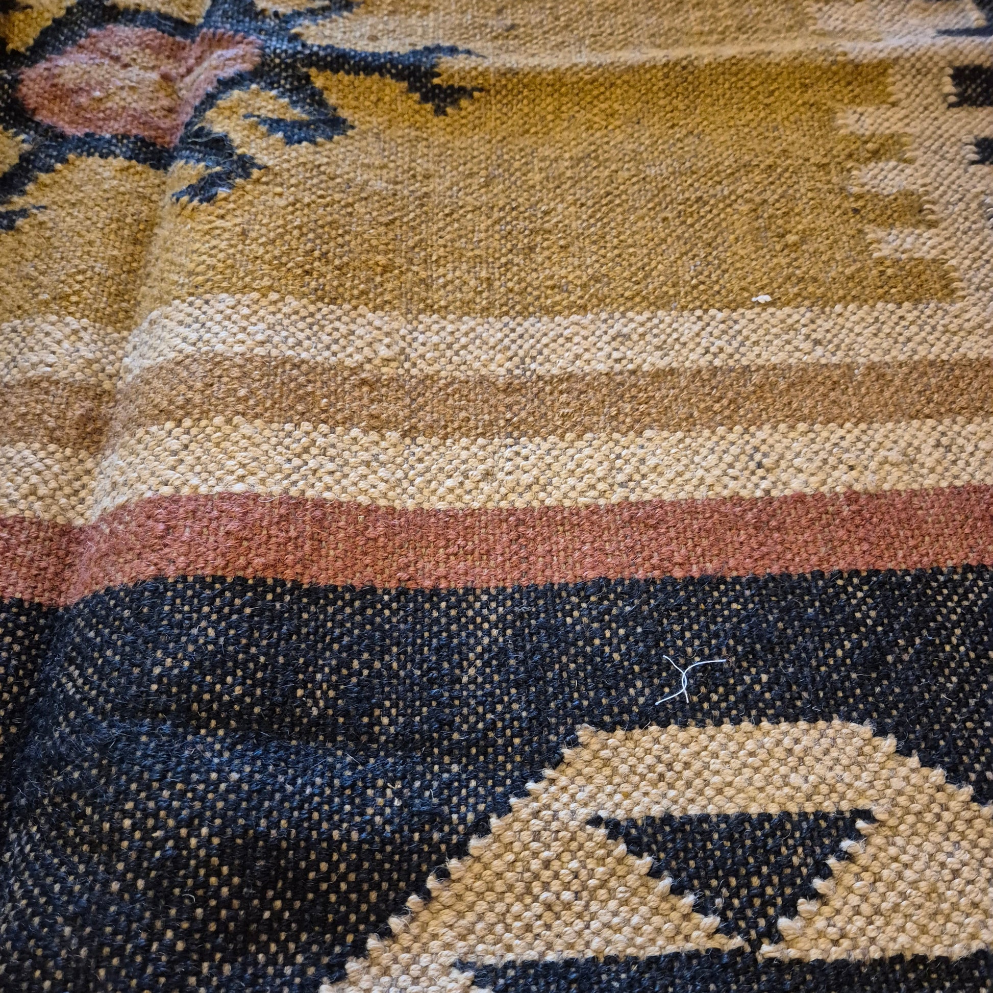 Add a touch of classic elegance to your space with this Kilim Rug (style krs14). Handcrafted with jute and wool for a rich and textured look, this rug boasts a beautiful earthy color palette that will bring warmth to any room.

5ft X 3ft