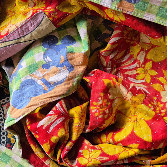 A colourful throw, made from up-cycled vintage Indian fabrics. Completely unique, no two are ever the same.
Front and back are also different giving the opportunity for a different look in different seasons
The throw features the distinctive kantha stitch.
A sustainable heirloom piece for gifting or self gifting.
220cm x 135cm approx
