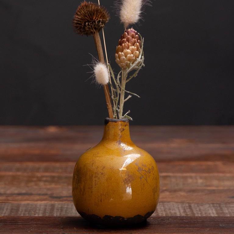 Beautiful ceramic cracked glaze bud vases in olive greeen. Also available in a range of muted tones. Size: 8cm high